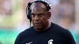 Woman who accused former Michigan State football coach of sexual harassment files intent to sue him and the school