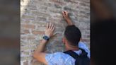 Outrage in Italy after tourist filmed carving his and girlfriend’s names into Rome’s Colosseum