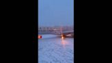 American Airlines plane slips off snowy runway after New York landing