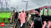 Mumbai rain: Netas get a taste of aam aadmi's woes, forced to alight from trains, trudge on flooded tracks | Mumbai News - Times of India