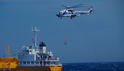 Woman swept to sea while swimming at a Japanese beach is rescued 37 hours later and 50 miles away