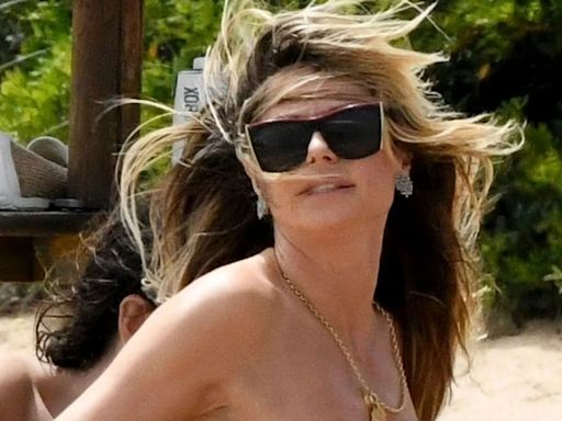 Heidi Klum, 51, goes topless at the beach with toyboy husband