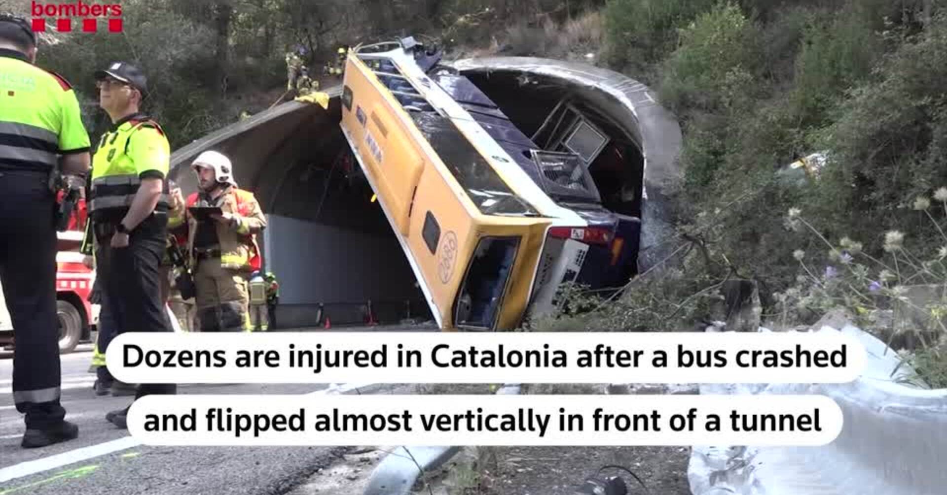 Spanish bus flips, gets wedged in tunnel entrance, injuring dozens