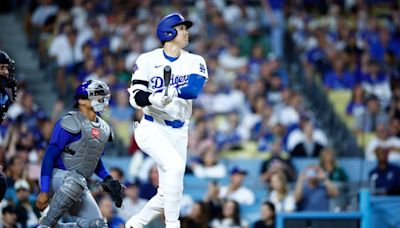 Dodgers hit 4 homers in 1st, then rally to beat Cubs 10-8. Shohei Ohtani hits 47th homer and steals 48th base