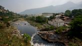 Nepal's holy Bagmati River choked with black sewage, trash