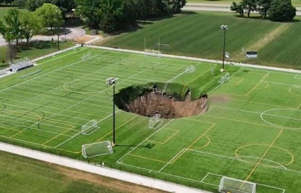 Sinkhole swallows soccer field in Illinois in shocking video