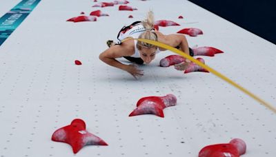 World-record holder Aleksandra Miroslaw wins Poland’s first gold of the Paris Games in speed climbing