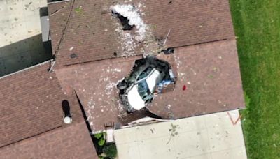 Car crashes through garage roof of southeast Minnesota home