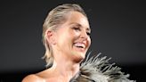 Sharon Stone stuns in a dramatic monochrome feathered gown