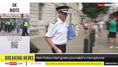 Met Police boss bizarrely snatches reporter’s microphone outside cabinet office when quizzed about riots