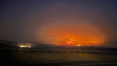 Wildfires threaten communities in the West as Oregon fire closes interstate, creates its own weather