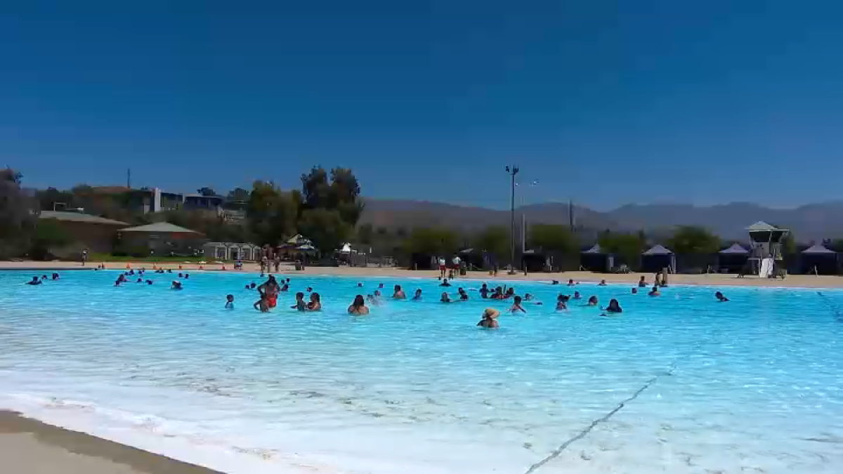 Families escape the blistering holiday heat at LA city pool