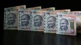 Rupee set to rally after exit polls predict Modi win