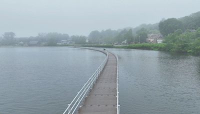 New 3,000-foot floating boardwalk allows visitors to "walk on water" in this Massachusetts city