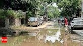 ‘Jailed in own homes’, say locals of Gurgaon's Sector 10A as overflowing sewage floods roads | Gurgaon News - Times of India