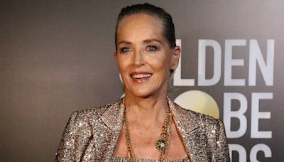 A sight for sore eyes... Sharon Stone loses her shiner