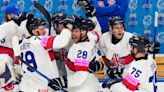 Britain tops Austria 4-2 for 1st win at hockey worlds, Germany beats France 6-3