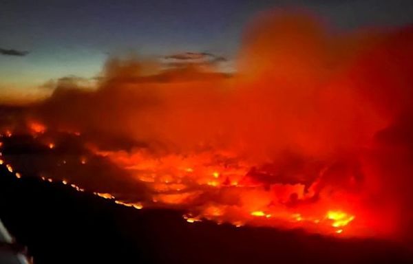 Rapidly-spreading fires are threatening to burn through Canadian towns and degrading air quality