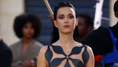 Katy Perry is totally naked under a barely-there geometric cut-out leather dress