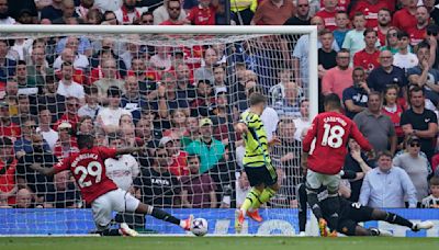 Arsenal beats Man United 1-0 to take title race with Man City to final day of Premier League season