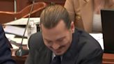 Johnny Depp laughs in court as Amber Heard says he's not an 'accurate historian' of what happened when he was drinking during a fight