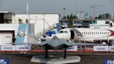 Paris air show takes off with historic plane order