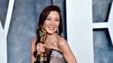 Michelle Yeoh visits her father’s grave in Malaysia with her Oscars trophy