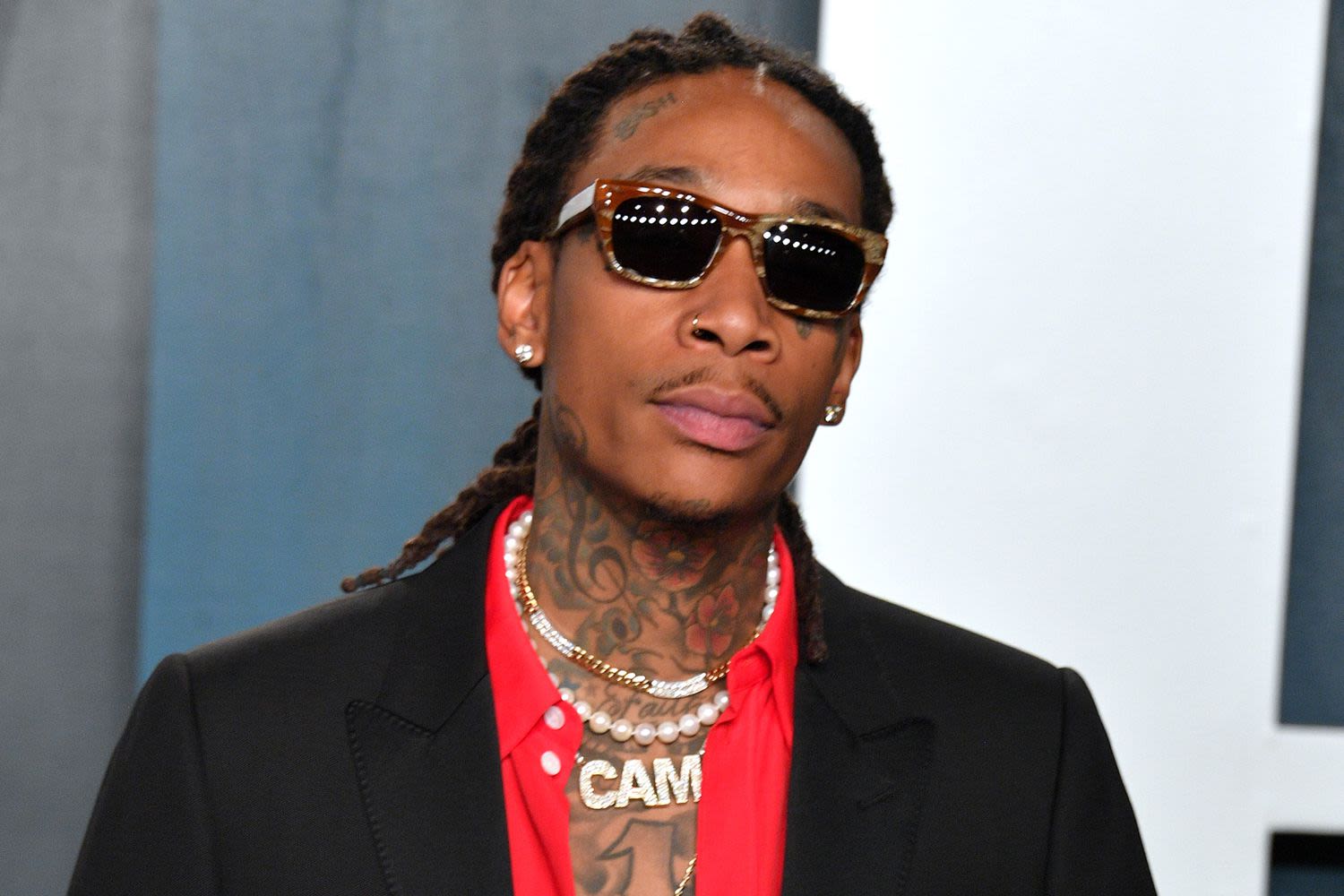 Wiz Khalifa apologizes for 'lighting up' onstage after Romania drug arrest: 'I didn't mean any disrespect'