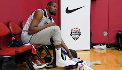 Durant slowed by sore calf at U.S. training camp