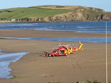 Man airlifted from beach after 'medical episode'