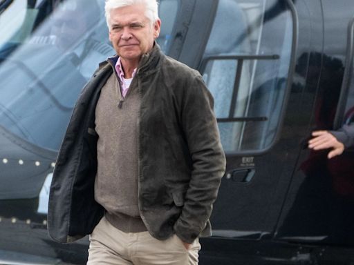 Phillip Schofield is all smiles in rare public appearance at British Grand Prix