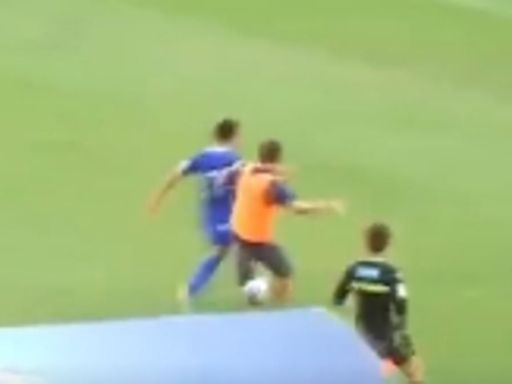 Italian coach sent off after running onto pitch and TACKLING player