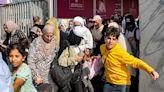 First civilians leave Gaza through Rafah border crossing into Egypt