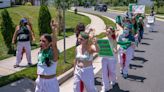 Pro-Choice Activists Covered in Fake Blood Deliver Baby Dolls to Amy Coney Barrett’s Home