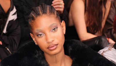 Willow Smith steps out in a bra and thigh-high stockings for glamorous appearance