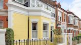 Tour this bright yellow cottage for sale in Battersea