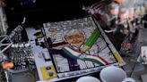 Hats, T-shirts and dolls reflect outgoing Mexican president's outsized presence in upcoming election