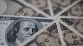 Dollar jumps, euro dips before Fed minutes