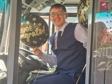 Bus-mad boy with autism given ride to school prom