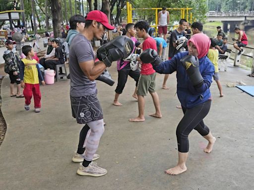 Indonesian women assert themselves with martial arts as gender-based violence remains a challenge