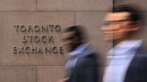 TSX ends flat in volatile trade, gold stocks gain