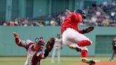 Rangers score 10 in the 2nd inning to defeat Athletics