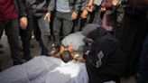 Airstrike kills 27 in central Gaza and fighting rages as Israel's leaders are increasingly divided