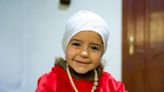 Celine, a little Syrian girl who can now hear, just like her big brother