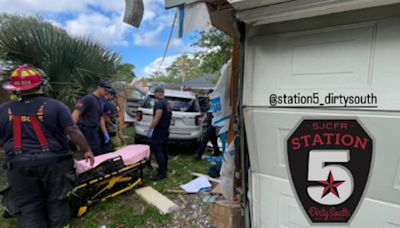 Fire department said possible medical emergency caused car to hit home in St. Johns County