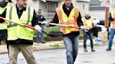 Governor Evers stops in Racine to fill potholes Tuesday morning