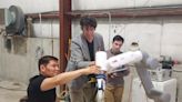 Kyrgyzstani delegates visited New Bedford Research & Robotics. Here's why they were here.