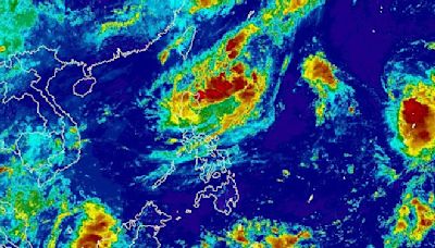 Tropical Depression Julian barely moving over Philippine Sea