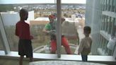 Nemours Children’s Hospital patients get surprise visit from window-washing Santa, elves