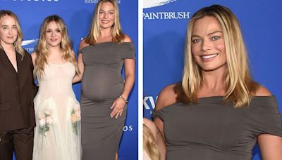 Pregnant Margot Robbie Favors Contemporary Maternity Style in Twisted-shoulder Bodycon Dress at ‘My Old Ass’ Screening With...